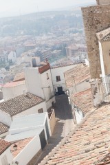 White bldgs narrow streets